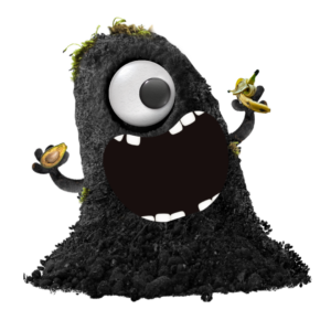 Iloinen mustankorkean monsteri pitää kädessään biojätteitä valmiina syömään ne.