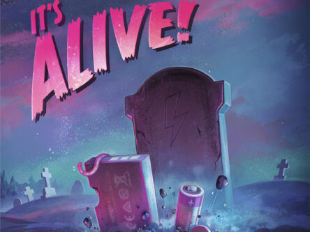 Kuvassa lukee "It's alive" ja hautausmaalta nousee akku.